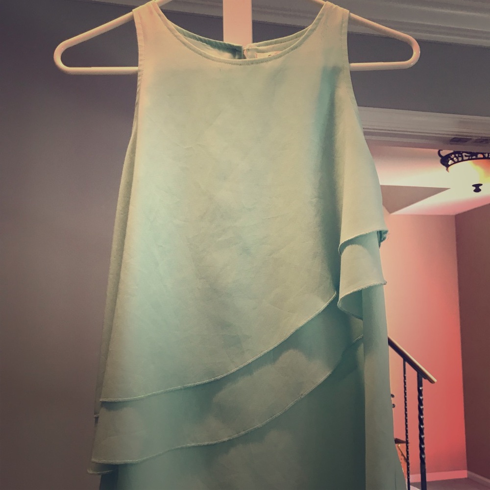 Blue-green sleeveless blouse